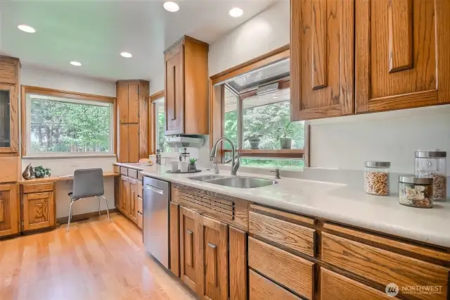 Kitchen with custom oak cabinetry designed for the eager chef