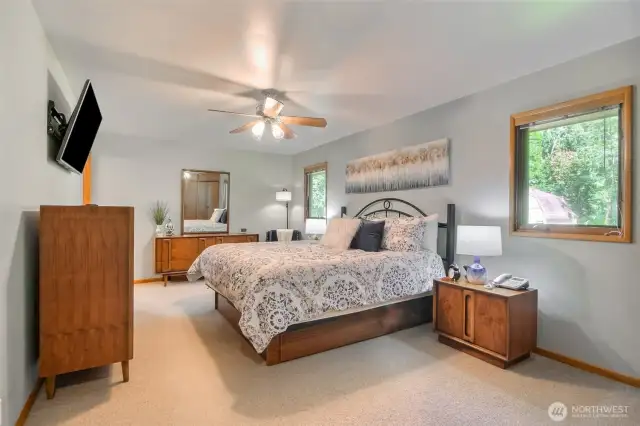 Primary Bedroom with windows to the rear yard
