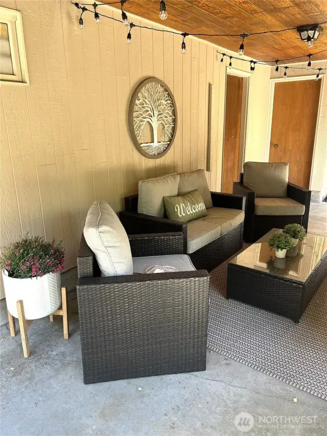 Covered Patio under deck with a fireplace!