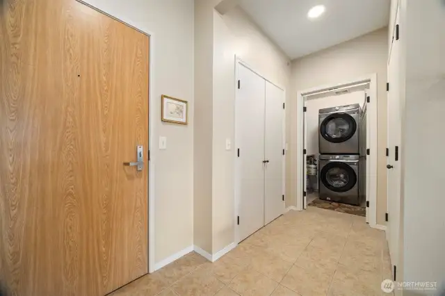 Laundry with storage on both sides of the hall