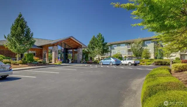 Other entrance to community clubhouse of w/ additional guest parking