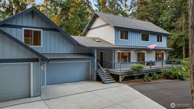 4 Car garage with unfinished bonus room above.