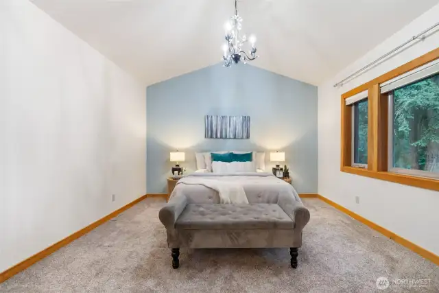 Primary bedroom sits just up a few stairs on the second level - completely separate from all other rooms!