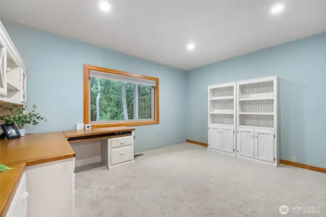 Upper 3rd level hosts a large loft space for home office or bonus room.