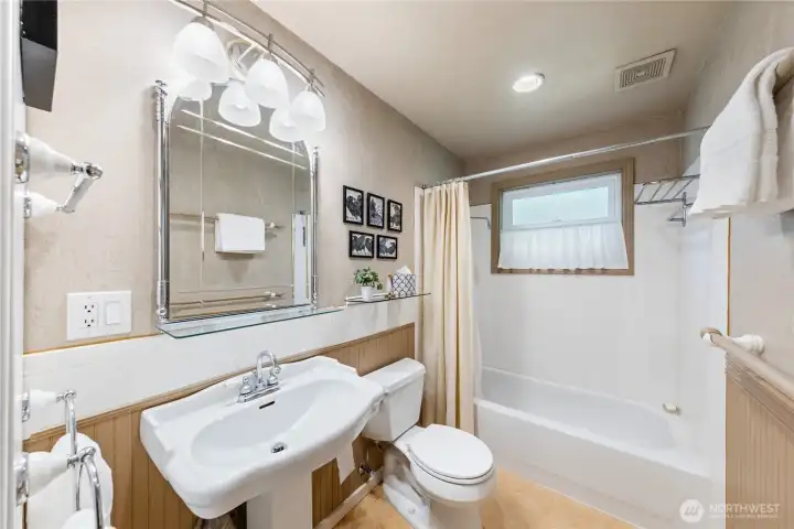 The upstairs full bathroom, with large storage cabinet, not seen in this photo.