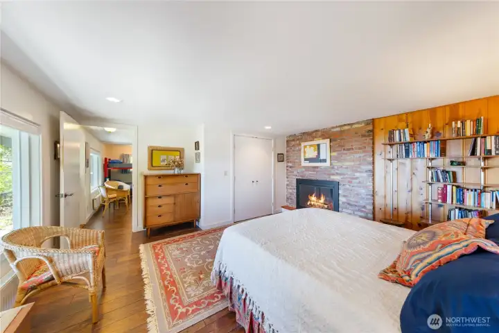 This is the largest bedroom, with plenty of closet space and ample bookshelves too. Comfy wood floors.