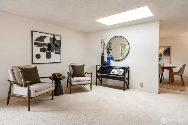 This living room hosts a lovely skylight for extra light.