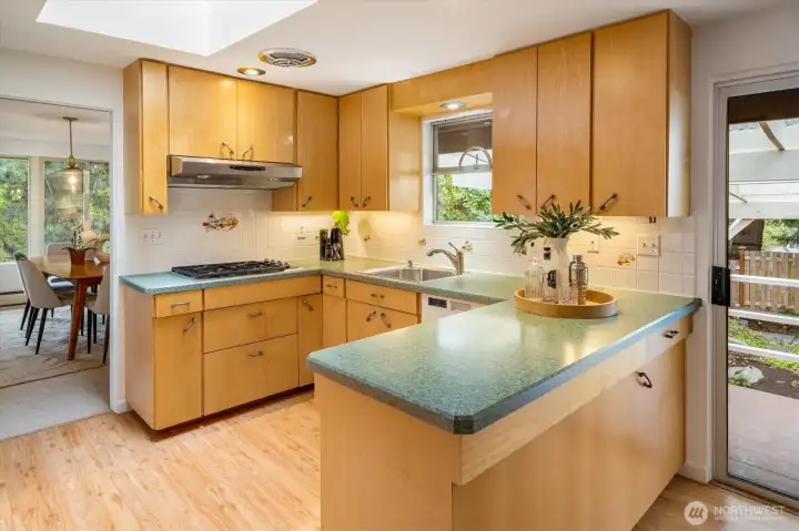 The eat-in kitchen has plenty of space to prep.