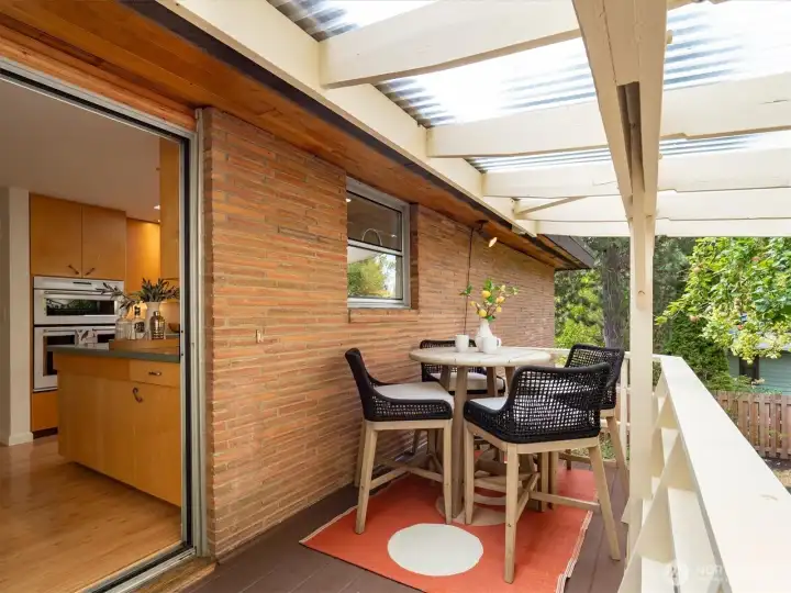 Just off of the kitchen is a lovely deck for a slice of piece and quiet.
