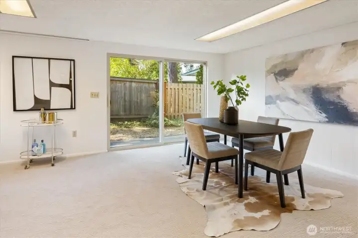 Access the backyard from the sliders in the large family room.