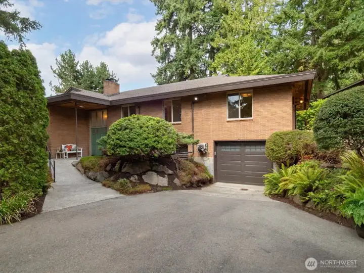 The long driveway leads right to the garage.