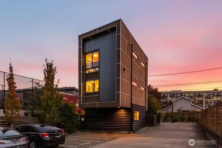 One covered parking space behind the townhouse.