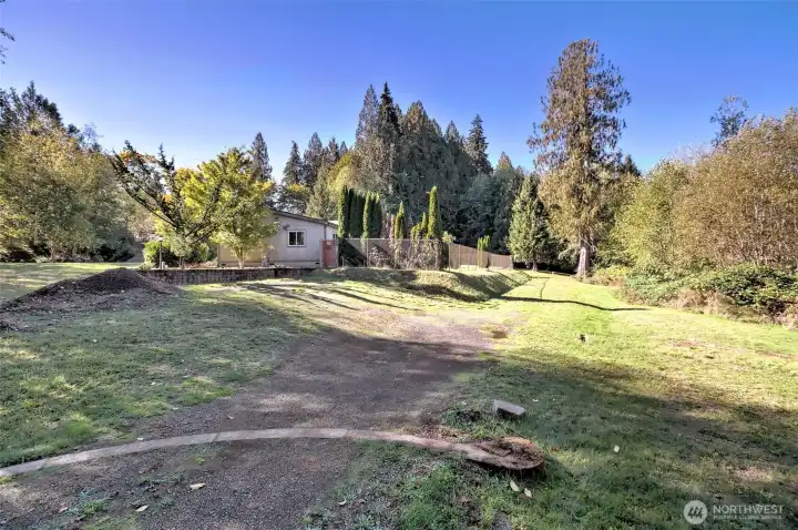 View from the gate as you enter the property. Notice the paved "arch" on the bottom that the gate wheel drives over...