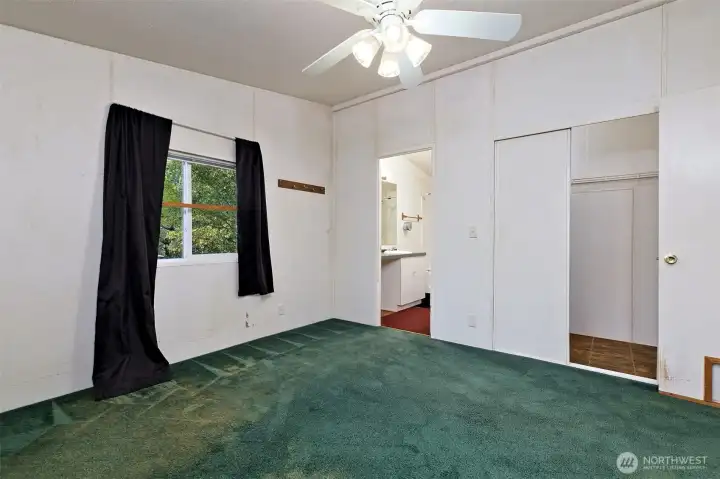 Primary bedroom with its own bath room.