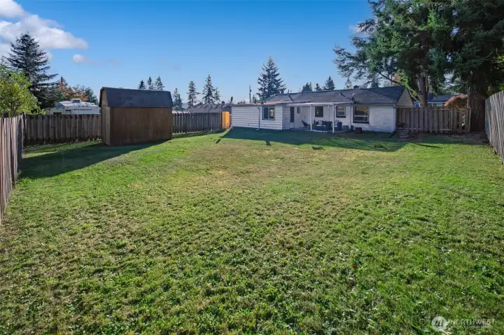 Enjoy an oversized, level lot—perfect for pets, gardening, or play.