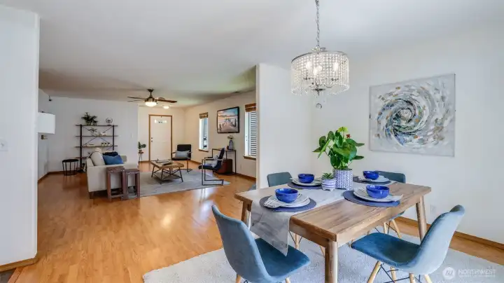 This dining room, conveniently located by the back door to the backyard, offers easy access to the open kitchen and seamless flow into the living room, making it perfect for entertaining