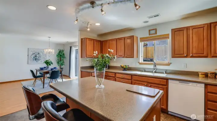 Designed for flow, this kitchen features a spacious island perfect for prep or casual meals—plus plenty of cabinet space to keep everything organized