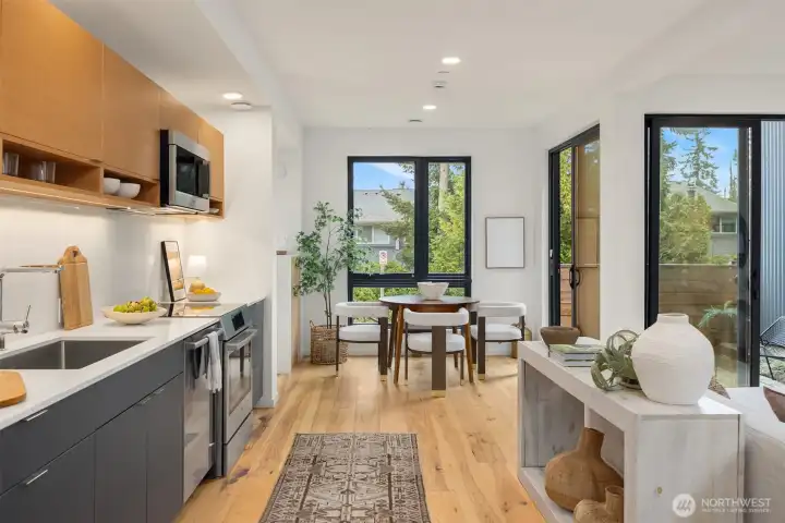 Every detail has been carefully considered, from the natural wood finishes and hardwood floors to the stylish quartz counters, creating an environment that exudes modern elegance and comfort.