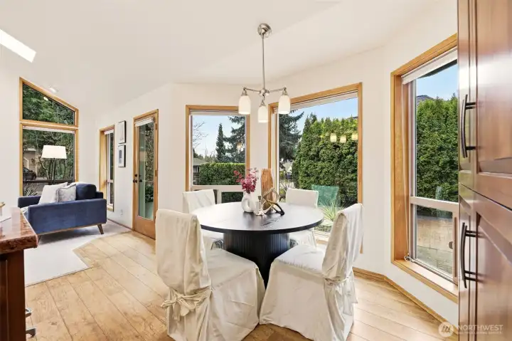 Dine-in kitchen with both island seating and a breakfast nook.