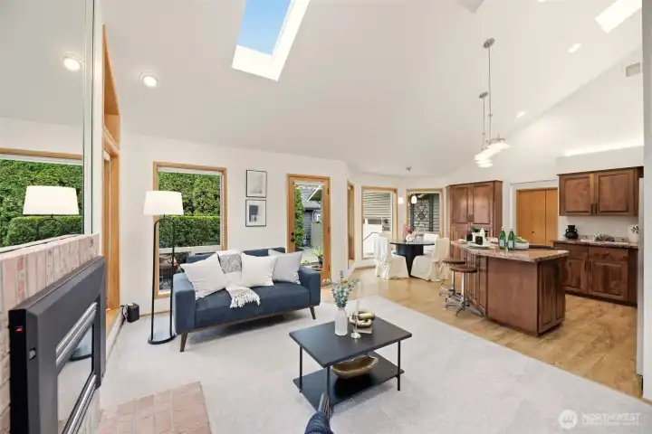 Open concept with kitchen, family room, and breakfast nook.