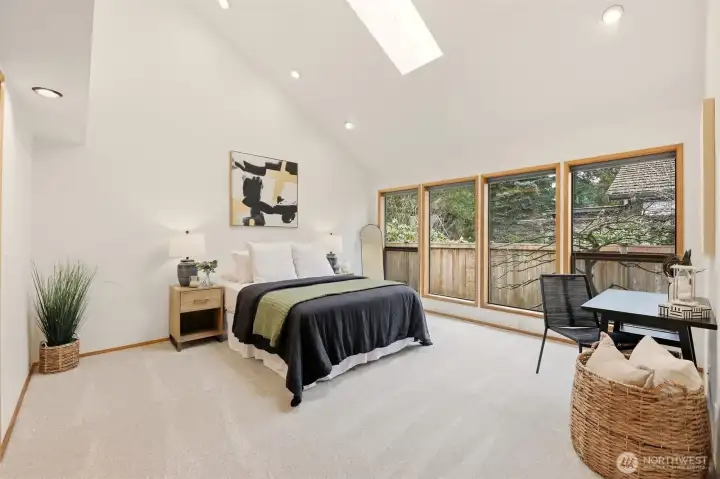 Second primary bedroom with direct access to the guest bathroom. Ideal for guests or multigenerational living.