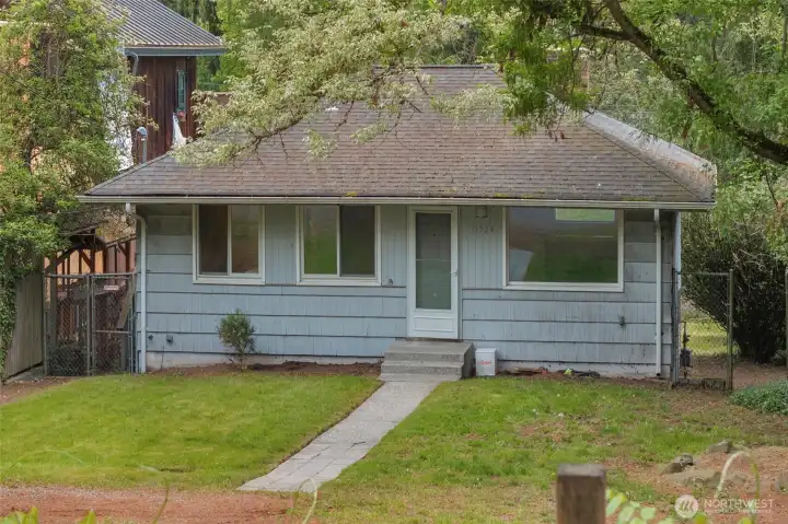 Property is located on a quiet tree lined street.