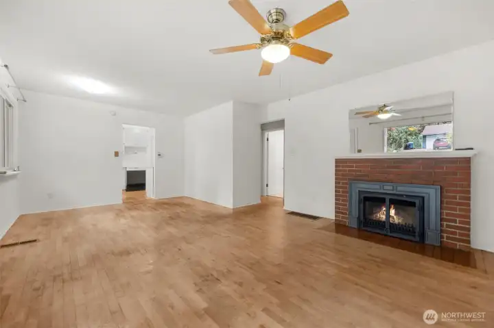The main level features hardwood floor and a gas fireplace.