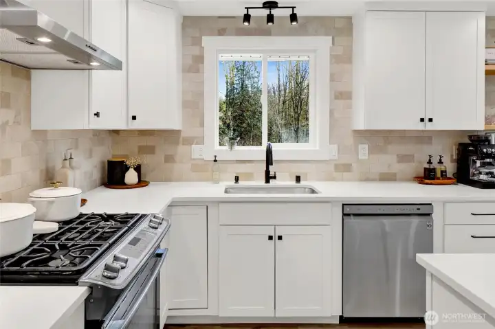 Fully remodeled kitchen featuring modern finishes and updated disign!