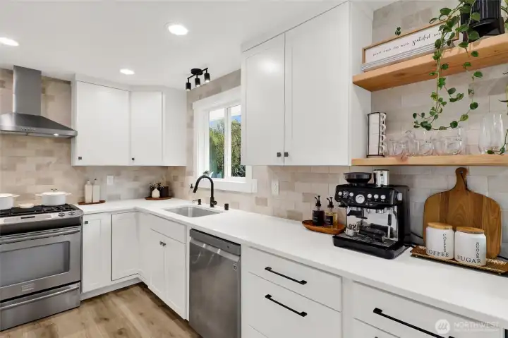 Fully remodeled kitchen featuring modern finishes and updated design.