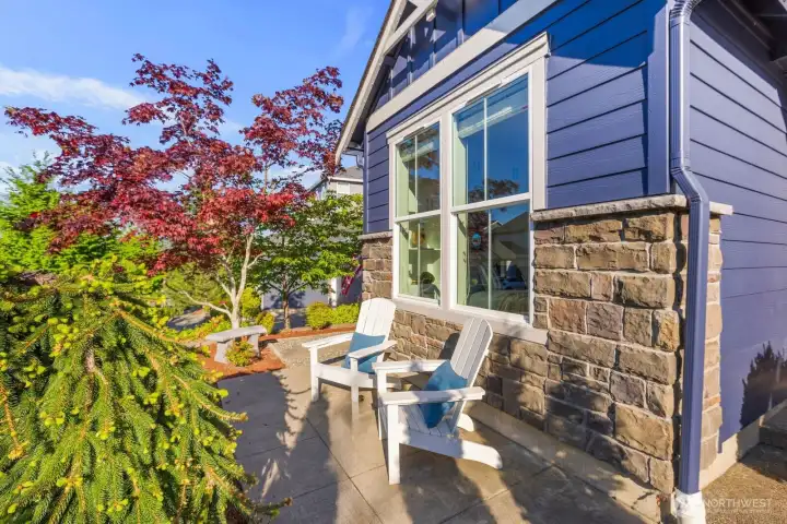Enjoy your morning coffee on the dedicated garden patio surrounded by beautiful landscaping and a peaceful setting.