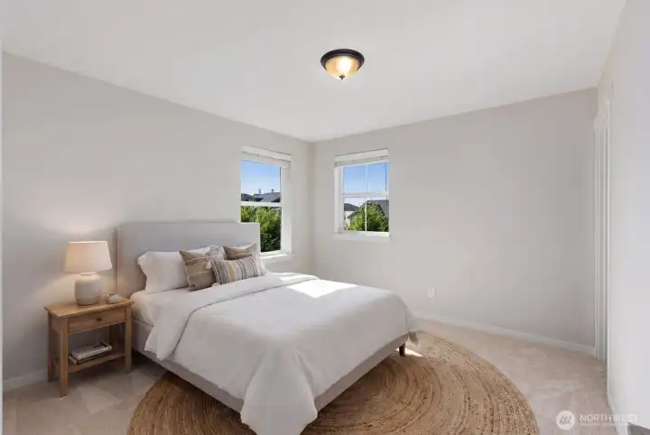 Bedroom 1 views of mountains from windows, virtually staged