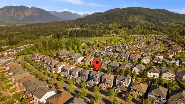 Perched in Eagle Pointe and surrounded by sweeping mountain views from its elevated vantage point