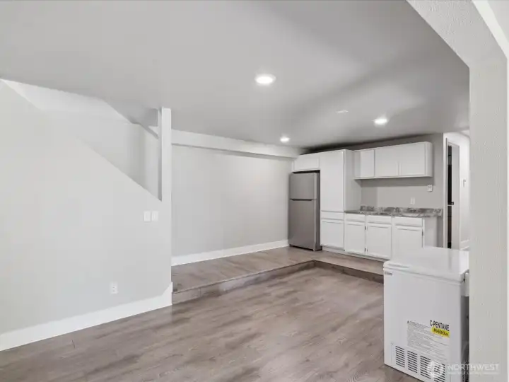 Countertop, Cabinets and Refrigerator
