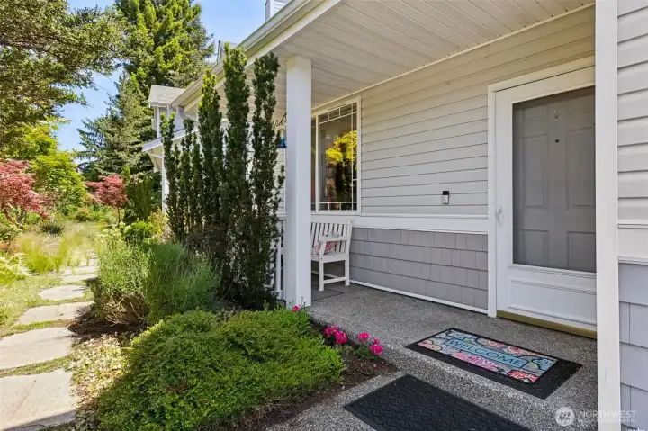 Welcoming front porch perfect for year round enjoyment.