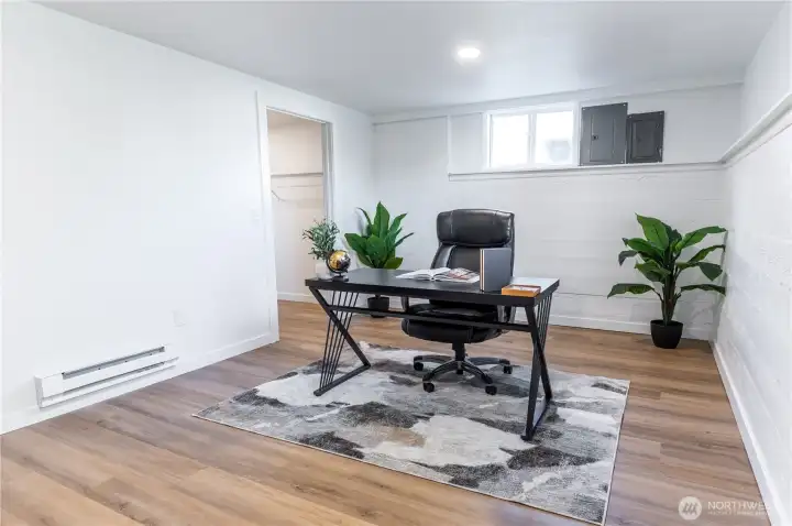 Flexible bonus room with walk-in closet, currently set up as a home office. Use it however your life calls for.