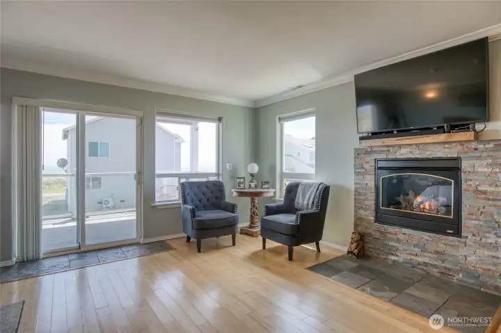 After Beach Combing along the Pacific Ocean enjoy warming by the Stone Faced Propane Fireplace!