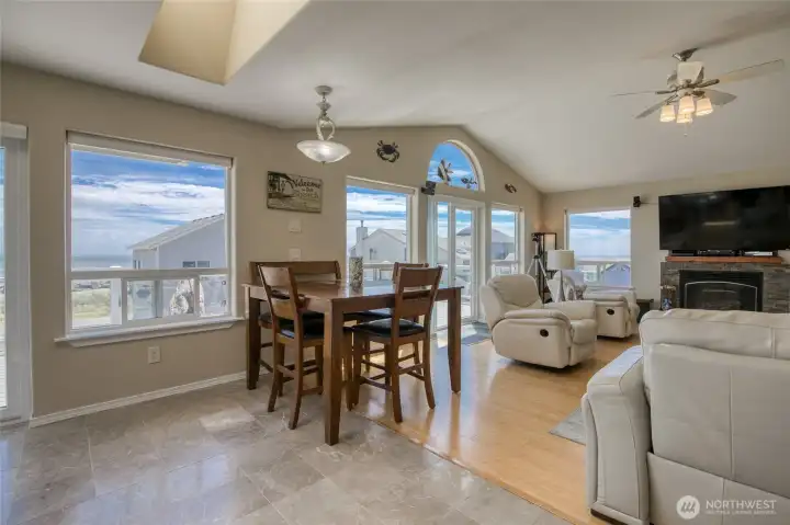 The dining area overlooks the Wrap Around Glass Trexc Deck and the fantastic views of Nature and Waterways!