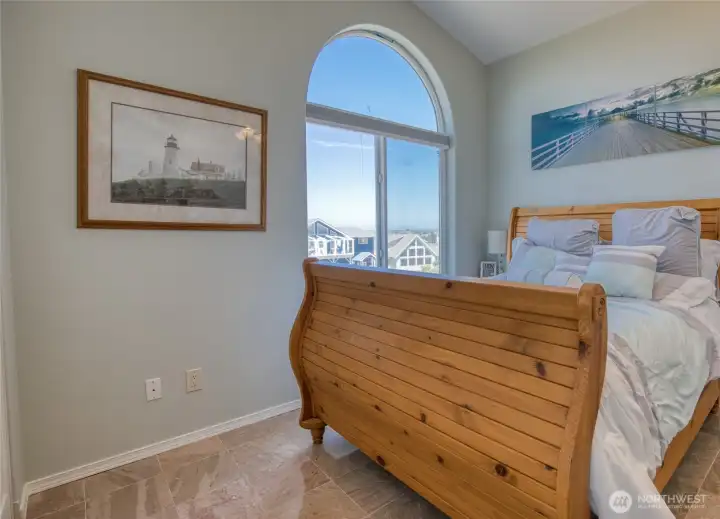 A different view of the Den/Guest room provides a panorama of the Olympic Mountains throught the Starburst Windows!