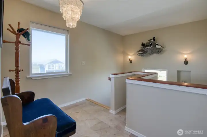 Traverse the Granite Foyer and Bamboo staircase to the second Level!