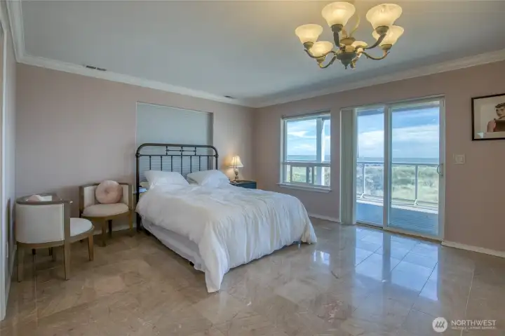 Across the hallway is the Queens Primary Abode where she will have sweet dreams in her room with Marble floors and fantastic views of the Whales and nature from the second level wrap-around Trex Deck!