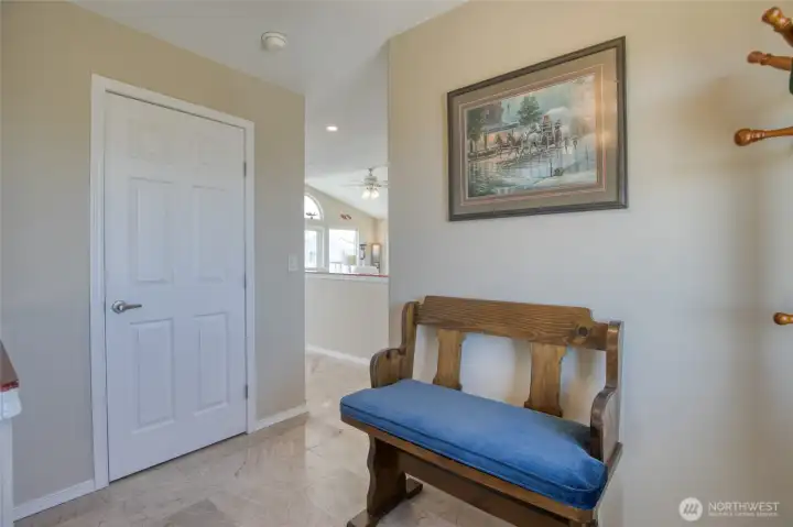 Down the second story Foyer to the First Floor or call the Hemlock Lined Elevator behind the closed door!