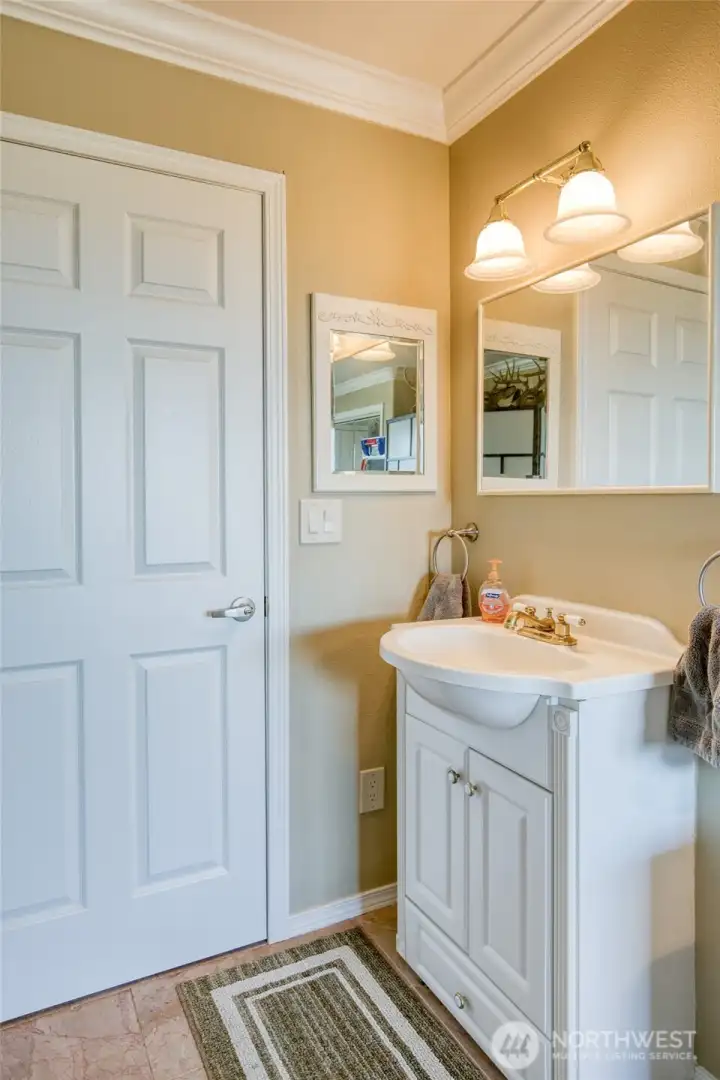 The Guest Suite has a private bath with continued Marble flooring!