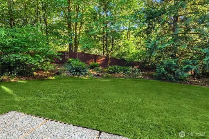 Outside, enjoy the large, fenced backyard with established landscaping and towering trees that create a peaceful, private setting. Outside, enjoy the large, fenced backyard with established landscaping and towering trees that create a peaceful, private setting.