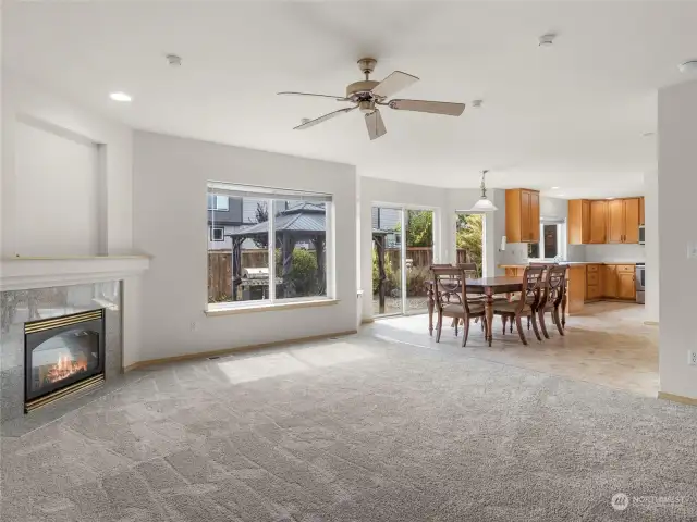 Open-concept kitchen seamlessly connects to the dining and living areas—perfect for family gatherings and entertaining.