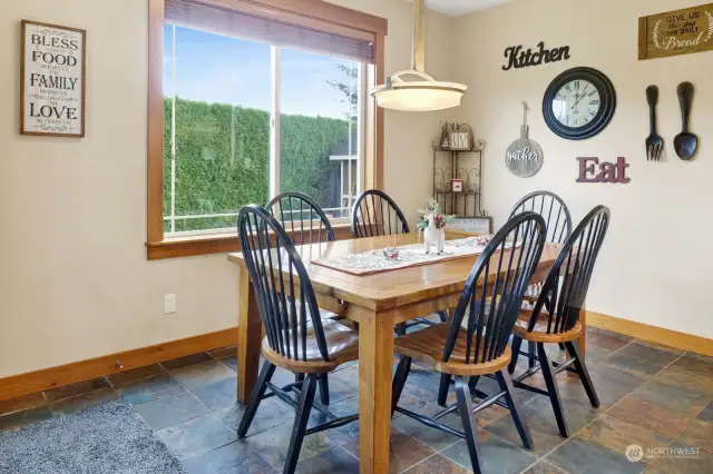 The dining room offers views of the private backyard.