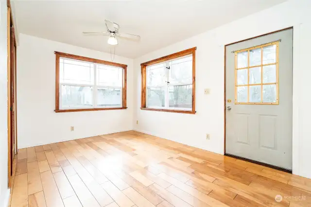 Primary bedroom on main floor with access to back yard.