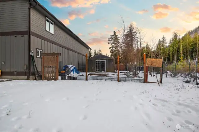 Backyard w/ large garden space w/ chicken coup