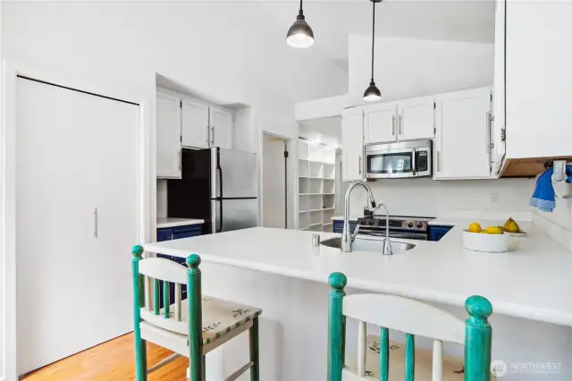The pantry is to the left and very large.