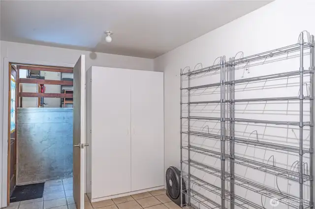 Utility room with large storage and new Hot Water Heater.