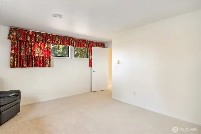 There is lots of space to be used as a bedroom.